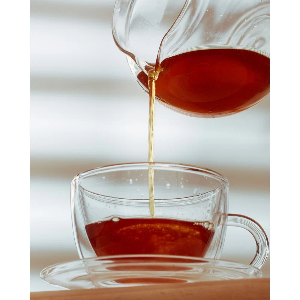 Té Negro Jin Jun Mei lata redonda naranja 80g – Camelia Tés de Origen